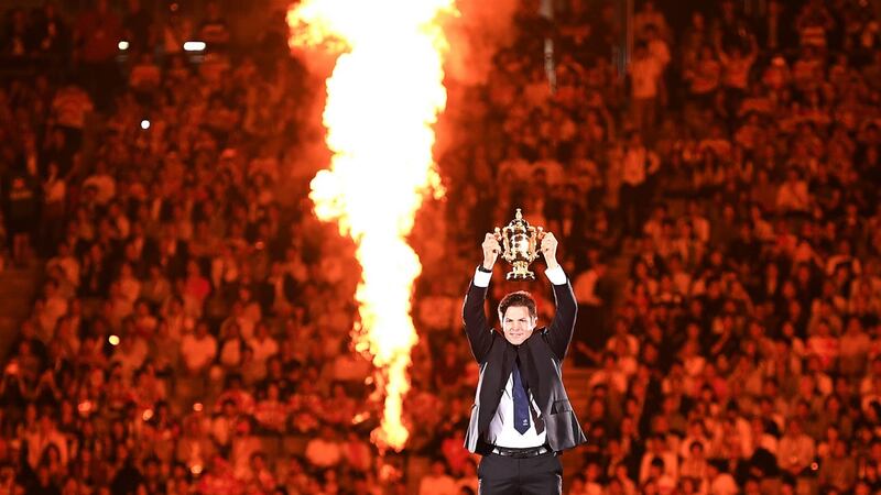 Former New Zealand international Richie McCaw holds the Webb Ellis trophy aloft during the Rugby World Cup opening ceremony. Photograph: Charly Triballeau/AFP/Getty Images