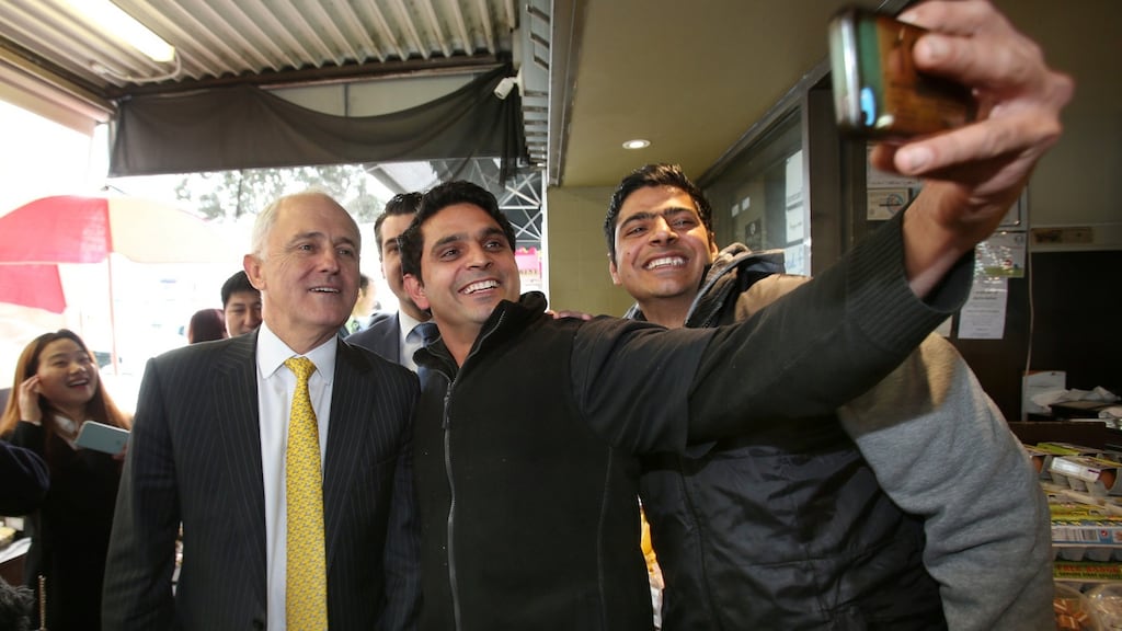 Australian prime minister Malcolm Turnbull  poses for a selfie during a street walk in Melbourne on Friday. Photograph: AAP/David Crosling/AAP/ Reuters