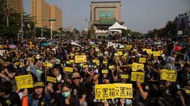 Over 100,000 protest in Taiwan over China trade deal