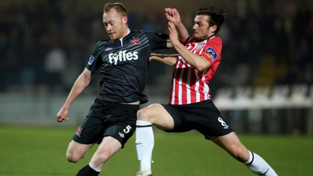 Derry City’s Philip Lowry closes down Dundalk’s Chris Shields during the SSE Airtricity League Premier Division match at the Brandywell. Photograph: Lorcan Doherty/Presseye/Inpho