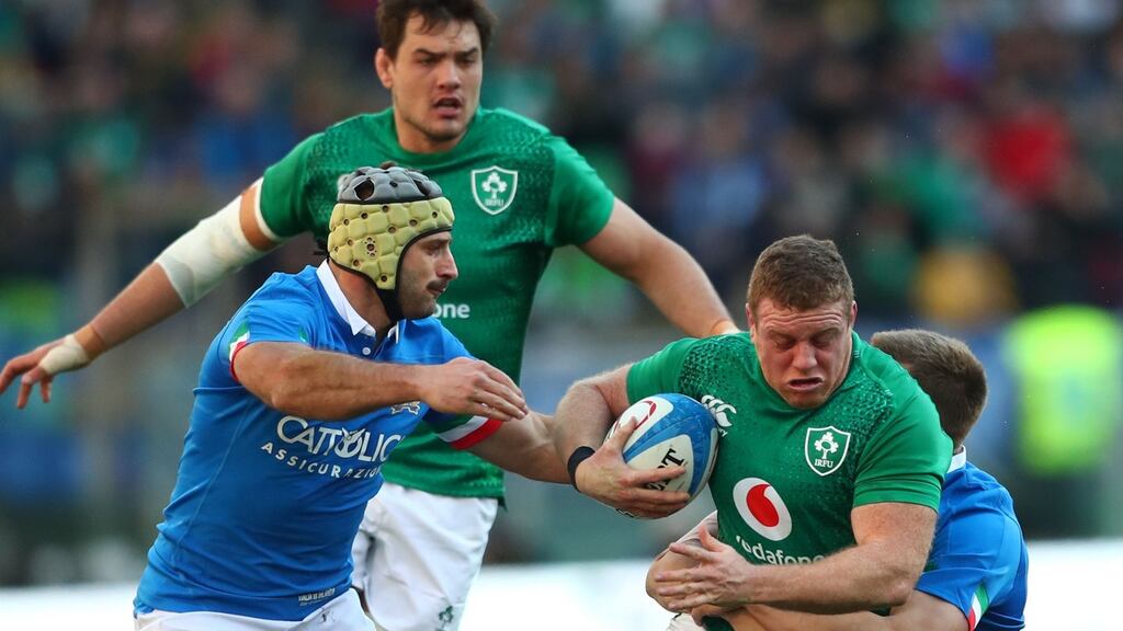Ireland’s Seán Cronin is tackled by Italy’s Angelo Esposito and Federico Ruzza during Sunday’s Six Nations round 3 match at Stadio Olimpico in Rome. Photograph: James Crombie/Inpho