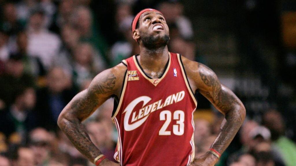 LeBron James is going home by signing with the Cleveland Cavaliers, he said in an article in Sports Illustrated on Friday.