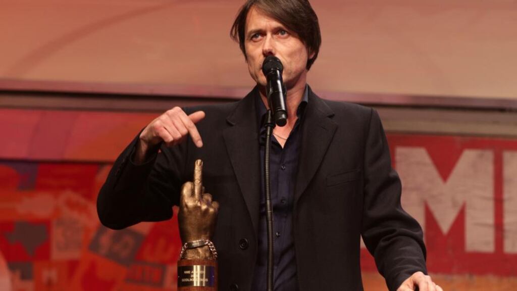 Brett Anderson of Suede collects the Godlike Genius Award during the NME awards ceremony in London. Last week, as the paper prepared for the awards, the ‘Guardian’ announced that discussions were being held about turning it into a freesheet. Photograph: Yui Mok/PA Wire