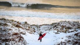 Power cuts reported and some schools to close as storm lashes country