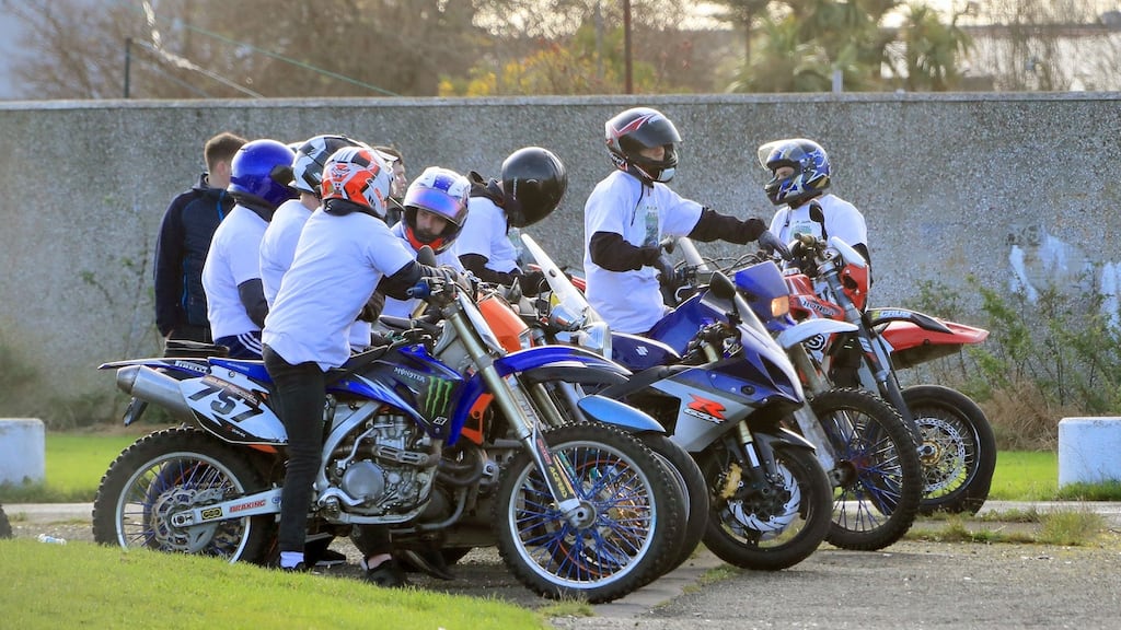 Friends form a guard of honour on motorcycles at the funeral of Jamie Tighe (24) from Darndale, who was shot dead while talking to friends on the street. Photograph: Collins