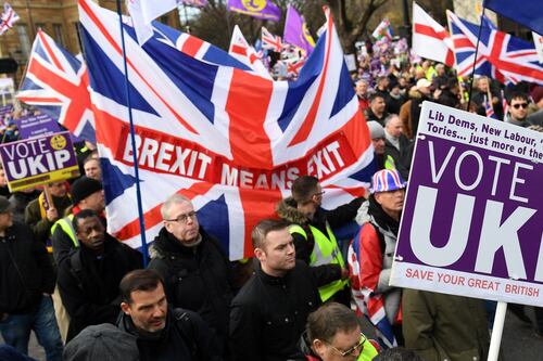 Pressure builds on May to delay Brexit deal vote