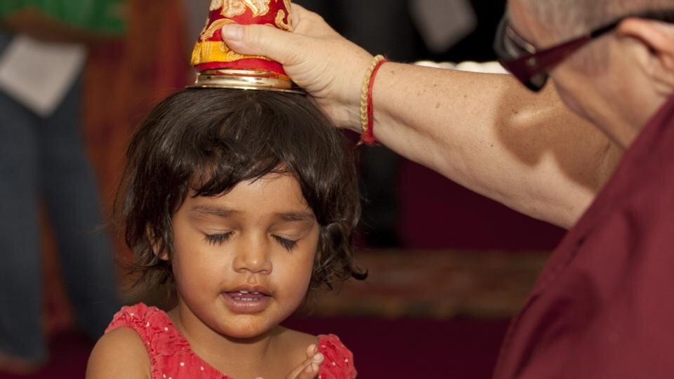 A blessing during a stop-off in Alice Springs on the Maitreya Relic Tour. Photograph: maitreyarelictour.com