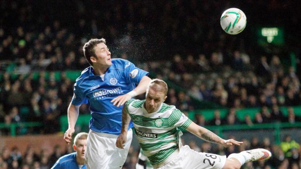 St Johnstone’s Tom Scobbie  gets above Celtic’s Scott Brown during the Scottish Premiership match at Celtic Park. Photograph:  Danny Lawson/PA