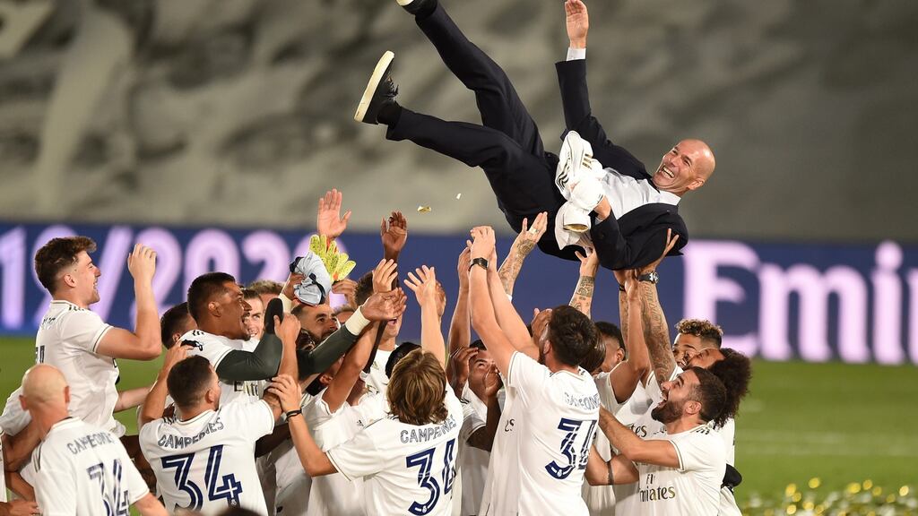 Real Madrid coach Zinedine Zidane is thrown up in the air by his players after Madrid secure the La Liga title last month. Photograph:  Denis Doyle/Getty Images