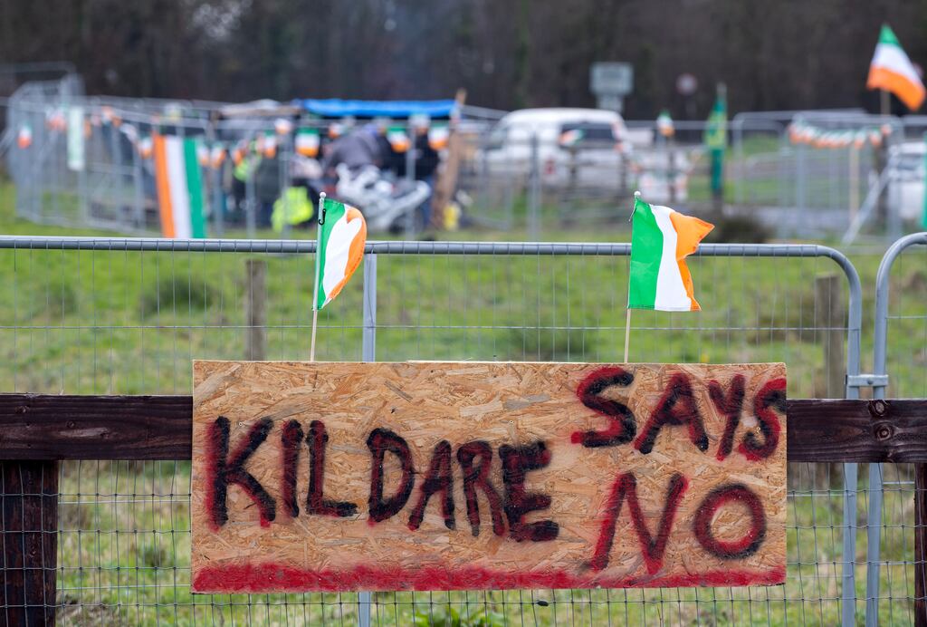 Signage erected by protesters at the site of an emergency accommodation facility which is under construction in the Newhall area of Naas, Co. Kildare. Photograph: Colin Keegan/Collins Dublin