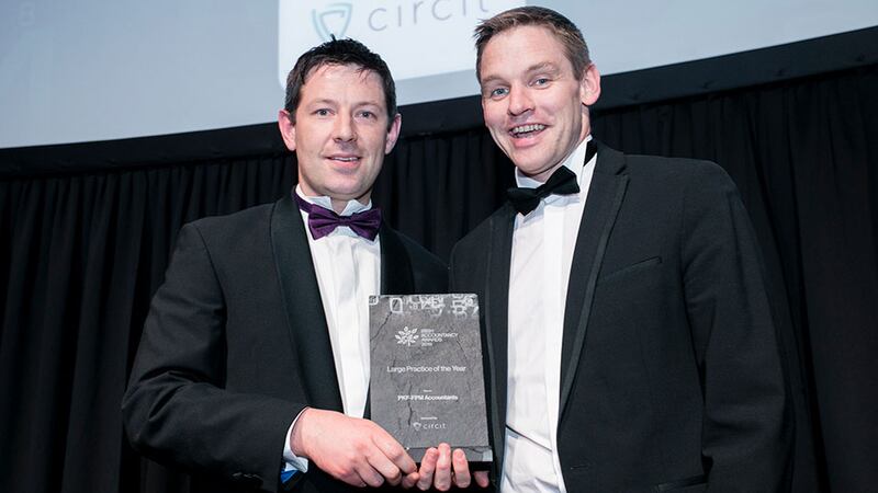 David Heath, founder & CEO, Circit, presents the Large Practice of the Year award to Michael Farrell, PKF-FPM Accountants.