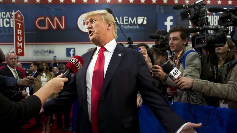 Republican presidential candidate businessman Donald Trump speaks with the media in the Spin Room following the Republican Presidential Debate, hosted by CNN, at The Venetian Las Vegas on Tuesday in Las Vegas. Photograph: L.E. Baskow/AFP/Getty Images
