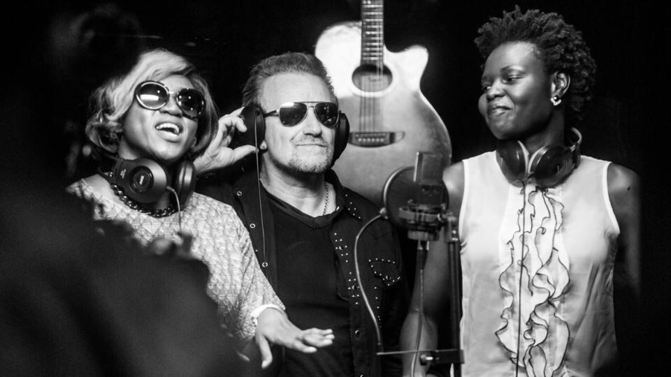 Bono in Lagos, Nigeria, with waje and selmor who sing on Strong Girl