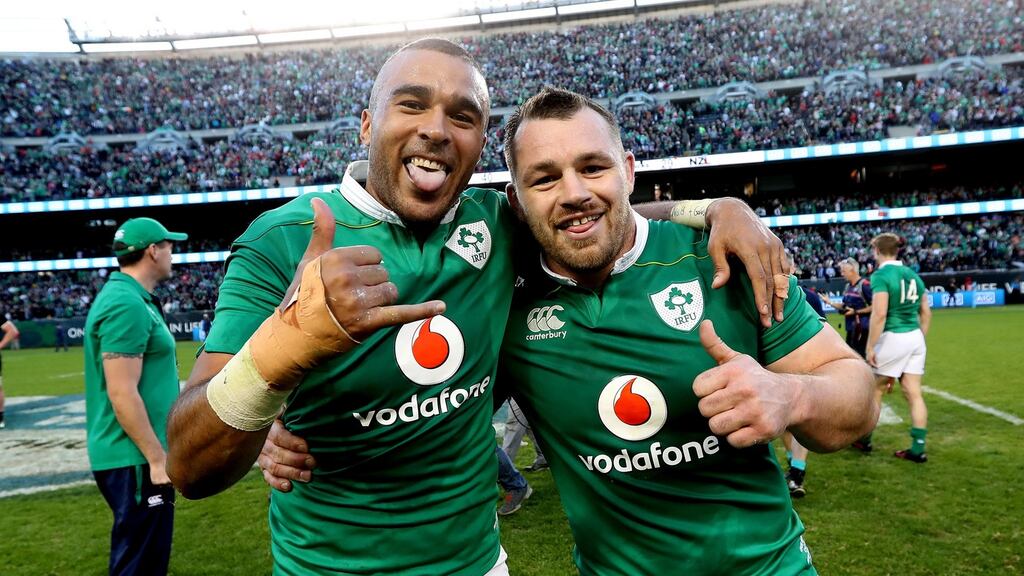 Simon Zebo and Cian Healy after Ireland’s historic win in Soldier Field. Photograph: Billy Stickland