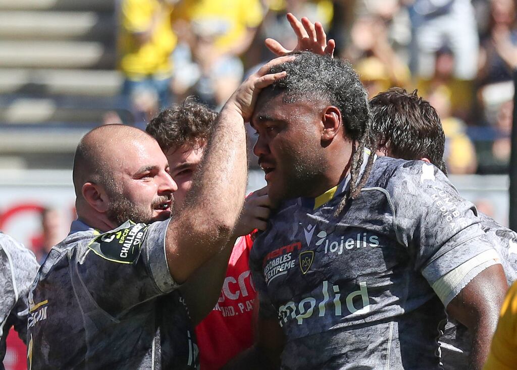 Pita Gus Sowakula of Clermont Auvergne celebrates with his team-mates after scoring a try in the Challenge Cup quarter-final against Ulster at Stade Marcel-Michelin. Photograph: Manuel Blondeau/Inpho