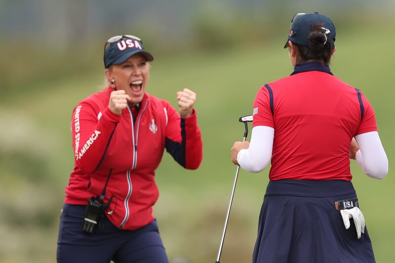 Team USA assistant captain Morgan Pressel celebrates with Rose Zhang after her winning putt on the 16th during the Friday foursomes matches at the 2024 Solheim Cup at Robert Trent Jones Golf Club in Gainesville, Virginia. Photograph: Gregory Shamus/Getty