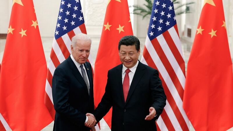 Then US vice-president Joe Biden with Chinese president Xi Jinping in Beijing in 2013. The growing economic might of China and its increasing authoritarian bent will be a major focus for the incoming US administration. Photograph: Lintao Zhang/New York Times
