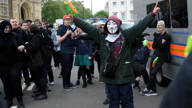 A man gestures while supporting a Unite Against Fascism (UAF) counter-demonstration to another one held by the far-right British National Party (BNP) against the killing of a British soldier, in central London today. Photograph: Dylan Martinez/Reuters