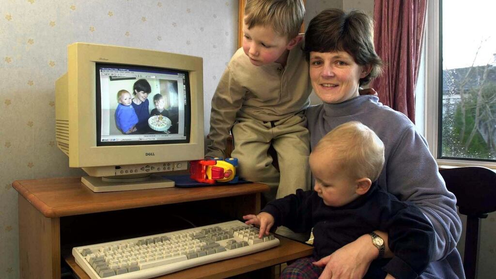 Erica Calder with her sons Cian (4) and Tom (13 months) with their new computer at home in Ballinteer, Dublin in 2002. Photograph: Frank Miller/The Irish Times