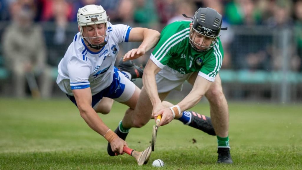 Limerick’s Graeme Mulcahy scores a goal despite the best efforts of Waterford’s Conor Gleeson during the Munster SHC round-robin game at the  Gaelic Grounds. Photograph: Morgan Treacy/inpho