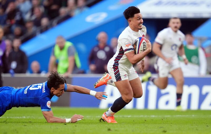 England's Marcus Smith on his way to scoring a try during the Six Nations match against Italy. Photograph: Adam Davy/PA Wire