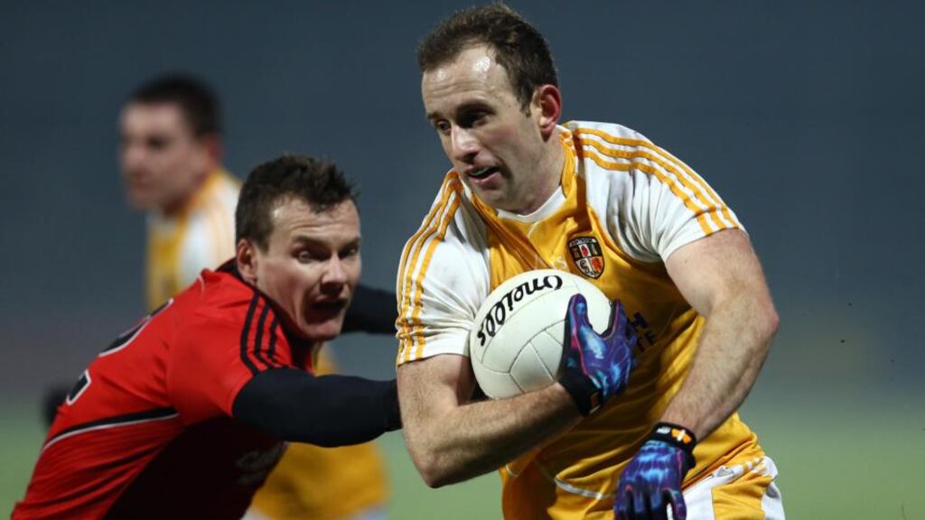 Antrim’s Michael Pollock (right) scored a sixth-minute goal against Leitrim at Páirc Seán MhicDiarmada, Carrick -on-Shannon. Photograph: Inpho
