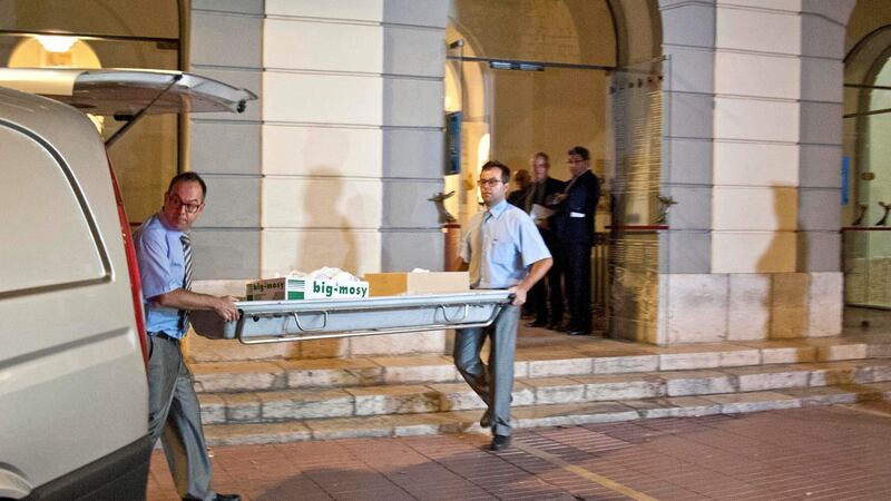Members of a forensic crew leave the Figueres Theatre-Museum after they exhumed the remains of late Spanish painter Salvador Dali in Figueres, Catalonia, on Thursday. Photograph: Robin Townsend/EPA