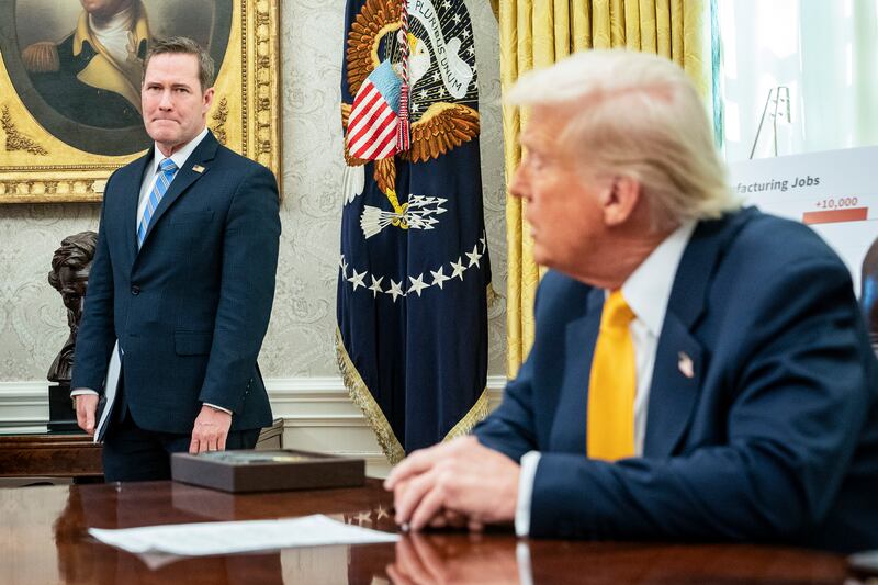 US national security adviser Mike Waltz listens on as US president Donald Trump delivers remarks in the Oval Office at the White House. Photograph: Haiyun Jiang/The New York Times