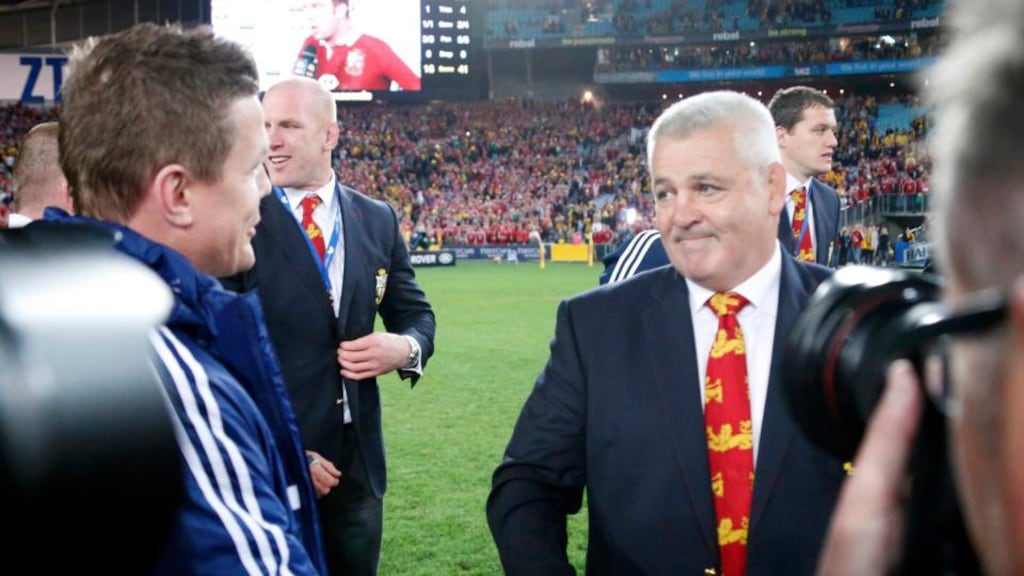 Lions coach Warren Gatland shakes hands with  Brian O’Driscoll following Saturday’s third Test victory in Sydney. Photograph: David Gray/Reuters.