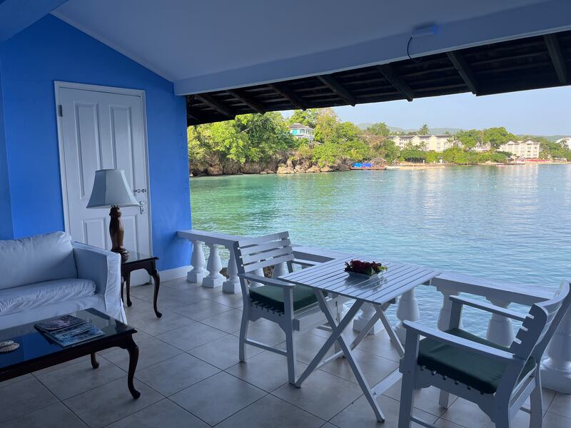 Lozzacking on the veranda of a room at the Jamaica Inn, which oozes colonial-style glam, with louvred shutters, antiques, whirring fans. Photograph: Deirdre Falvey