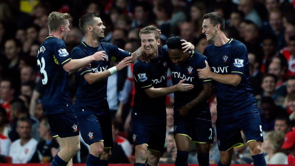 Southampton’s Nathaniel Clyne (second from right) celebrates with team-mates after scoring the winning goal against Arsenal at the Emirates. Photograph: Stefan Wermuth/Reuters.