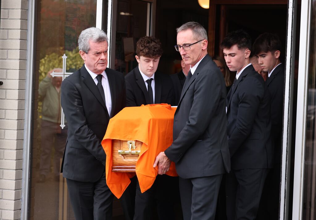Former Fianna Fáil minister Mary O'Rourke's sons Feargal O’Rourke and Cllr Aengus O’Rourke (front), along with other relatives, carry her coffin from the church following her funeral mass in Athlone on Monday. Photograph: Dara Mac Dónaill / The Irish Time