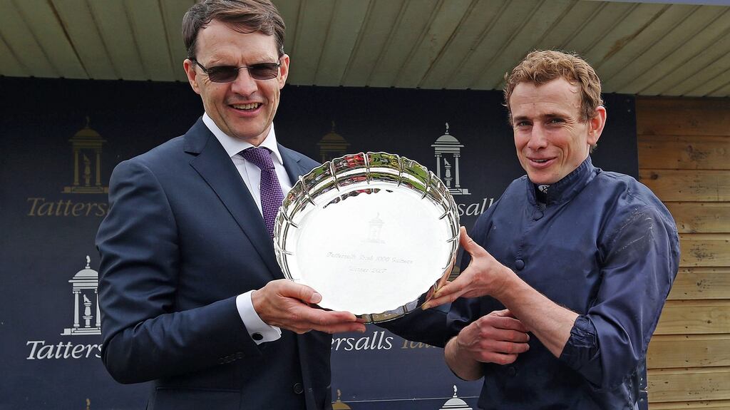 Aidan O’Brien and Ryan Moore after winning the Tattersalls Irish 1,000 Guineas with Winter at the Curragh. Photograph: Lorraine O’Sullivan/Inpho