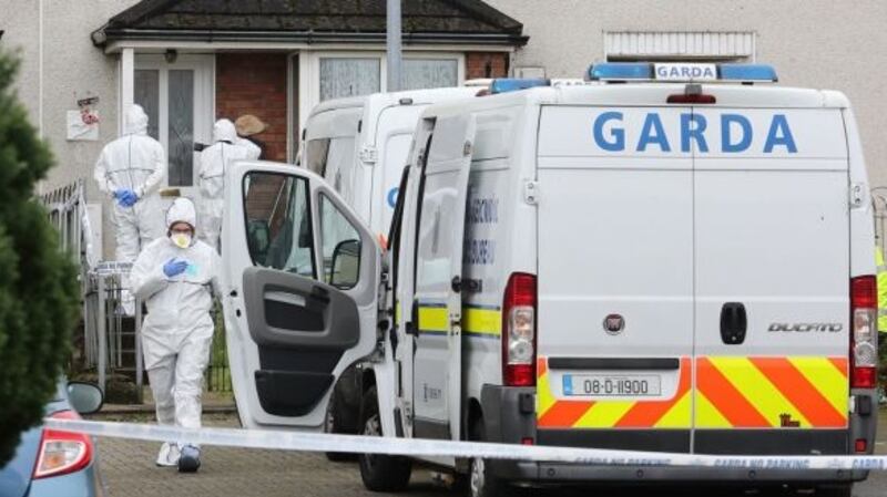 Forensic officers at a house in Limerick where the body of the 11-year-old boy was discovered last Sunday evening. Photograph: Niall Carson/PA