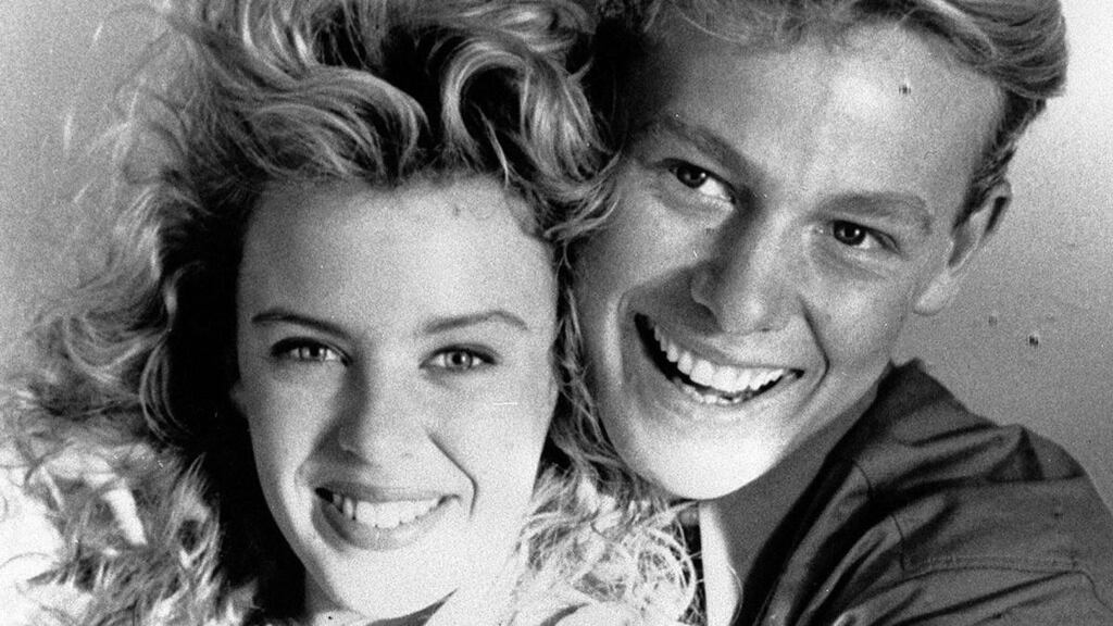 Kylie Minogue, here with fellow heartthrob Jason Donovan back in the day, will perform Sunday at Glastonbury. Photograph: PA Wire