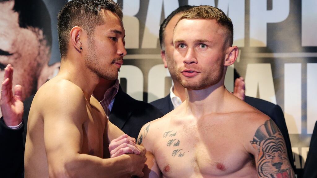 Nonito Donaire and Carl Frampton at the official weigh-in ahead of their fight in Belfast. Photograph: Jonathan Porter/Inpho