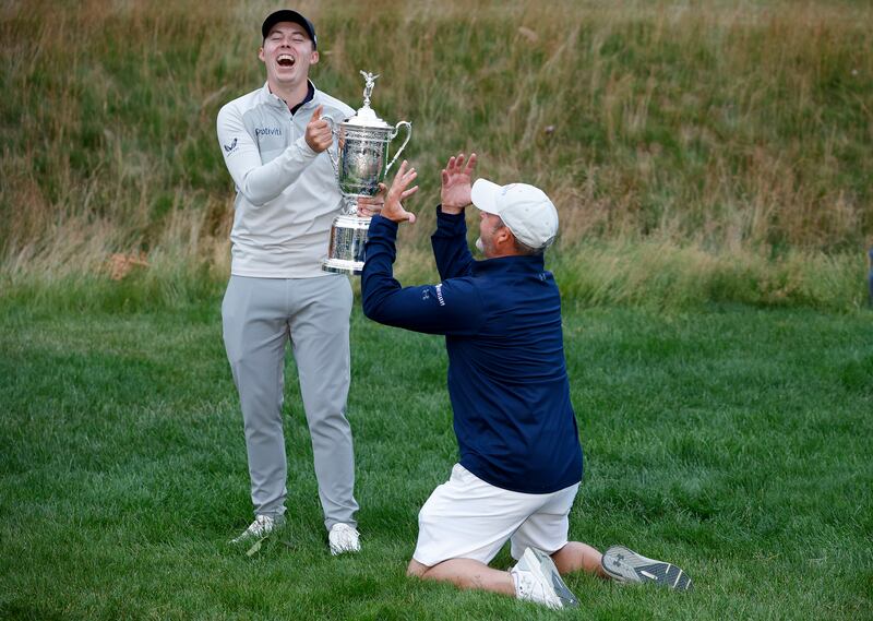 Matt Fitzpatrick and his caddie Billy Foster celebrate with the US Open trophy last year. Photograph: Jared C Tilton/Getty Images