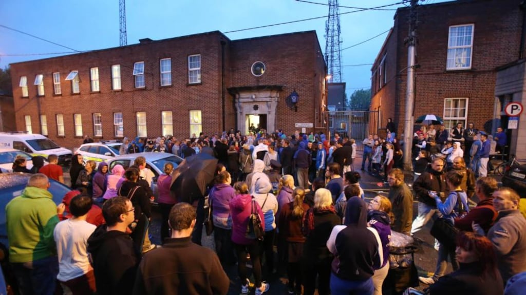 Crowds of parents and members of the public gather outside Athlone Garda Station as a man is due to appear on sexual assault charges. Photograph: PA