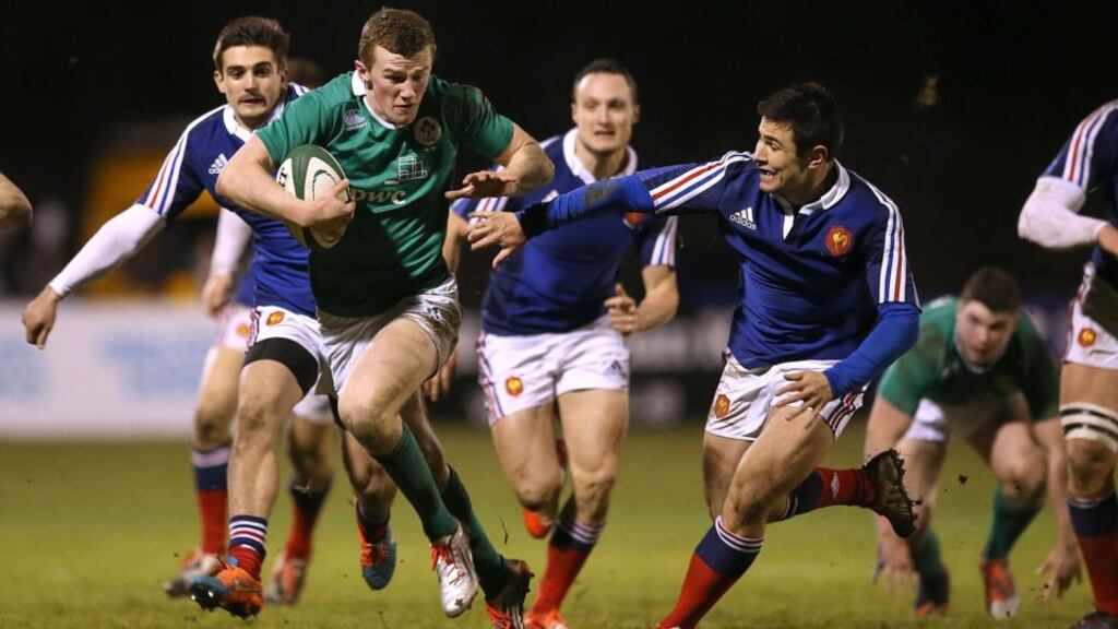 Ireland’s Steven Fitzgerald bursts past Lucas Meret to score his Six Nations debut try against France in Athlone. Photograph: James Crombie / Inpho