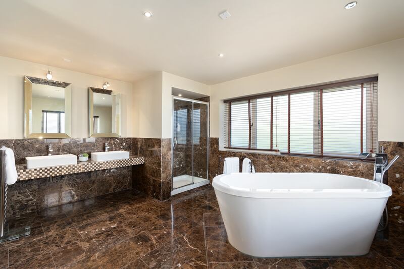 The house has five bathrooms