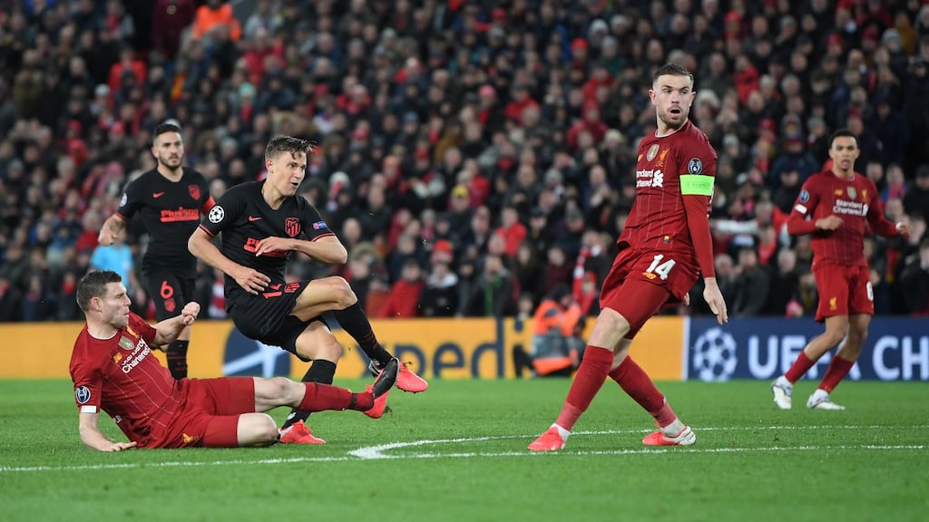Marcos Llorente scores Atletico Madrid’s  second goal during the Champions League round of 16 second leg match against  Liverpool  at Anfield. Photograph: Laurence Griffiths/Getty Images