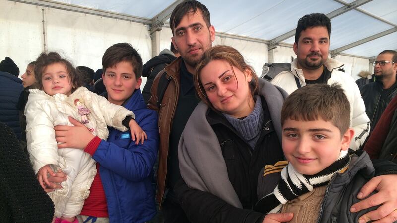 ‘We feel safe at last’: Rana Dagestani and her family, from the Iraqi city of Mosul, at the migrants’ transit camp in Dobova, Slovenia. Photograph: Dan McLaughlin