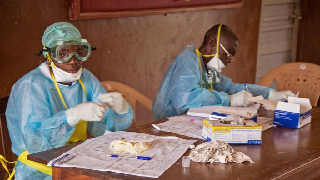 Health workers wearing protective clothing and equipment in Sierra Leone, where there is an outbreak of the deadly Ebola virus. Photograph: Michael Duff/ AP Photo