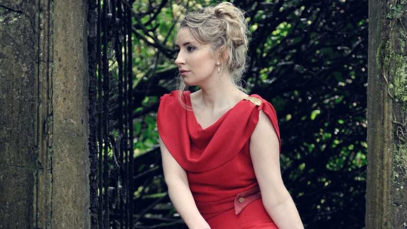 Felicity wears a red tweed dress, €455. Photograph: Michael Mac Sweeney/Provision