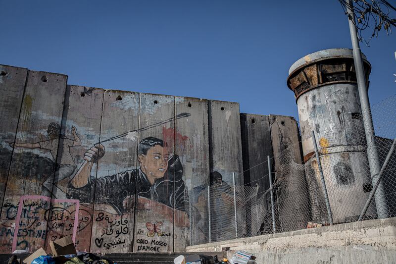 A mural on the West Bank separation barrier, or 'apartheid wall', which wraps around Aida refugee camp