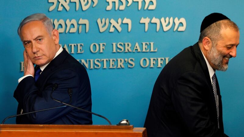 Israeli prime minister Binyamin Netanyahu and interior minister Arye Deri: deal with UN refugee agency cancelled shortly after it was announced. Photograph: Menahem Kahana/AFP/Getty Images