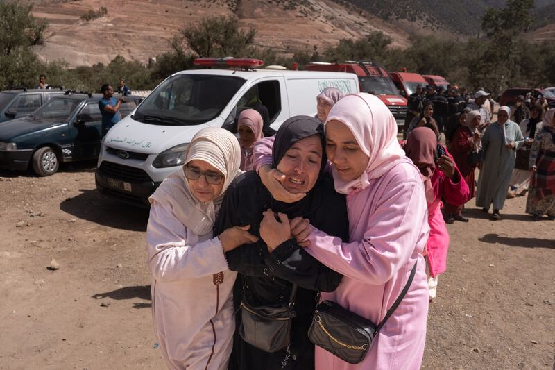 A woman mourns after recognising an earthquake victim in Tafeghaghte, in the Al Haouz region of Morocco. Photograph: Nathan Laine/Bloomberg