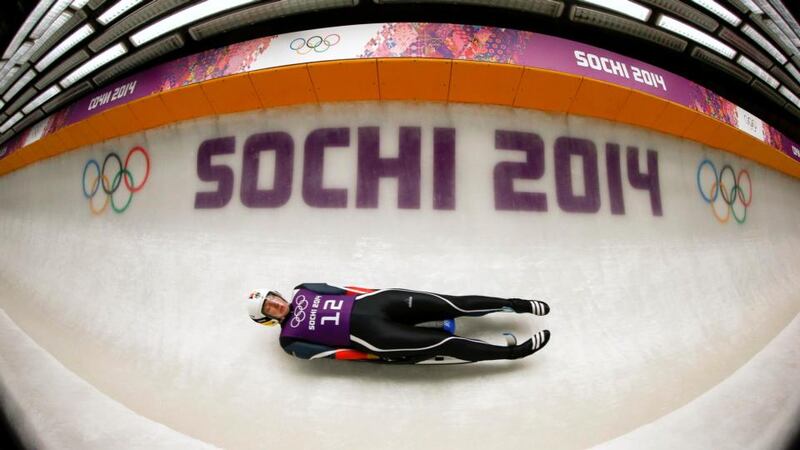 Germany’s Tatjana Huefner trains for the women’s luge event in Rosa Khutor, near Sochi. The opening ceremony for the Winter Olympics takes place today. Photograph: Arnd Wiegmann/Reuters.