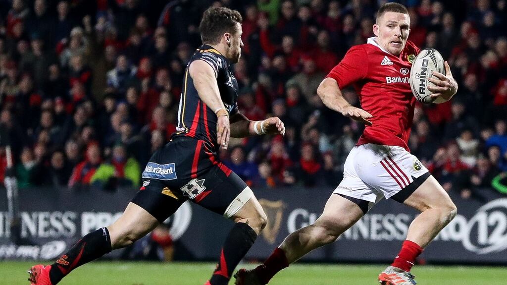 Andrew Conway on his way to scoring a try against Newport Gwent Dragons at Musgrave Park. Photograph: Tommy Dickson/Inpho