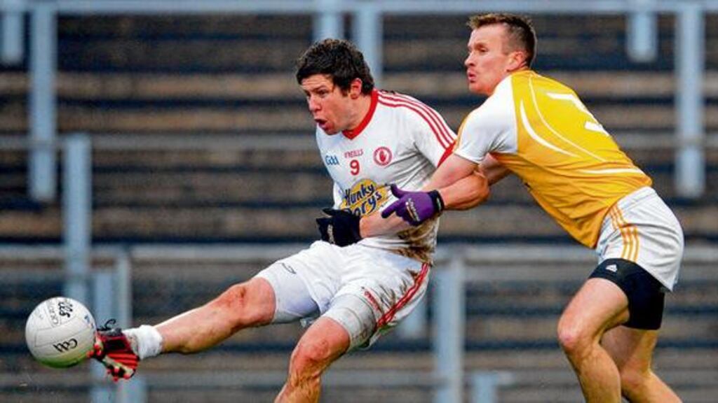 Tyrone's 10-year veteran Seán Cavanagh in action against Antrim's Paul Doherty during the McKenna Cup clash at Casement Park in January Photograph: Russell Pritchard/Presseye/Inpho